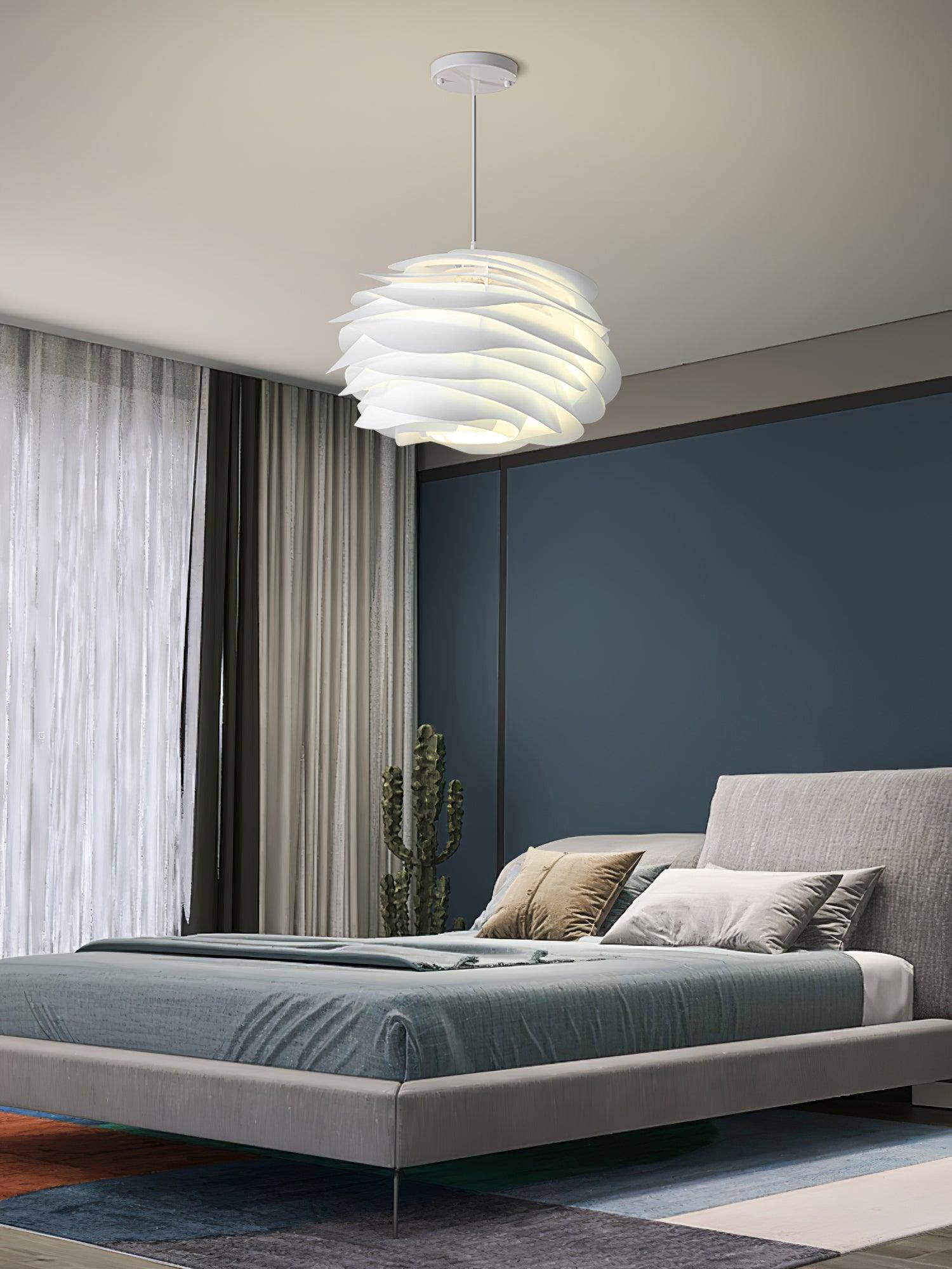 Floral pendant light close detail of white petal shade