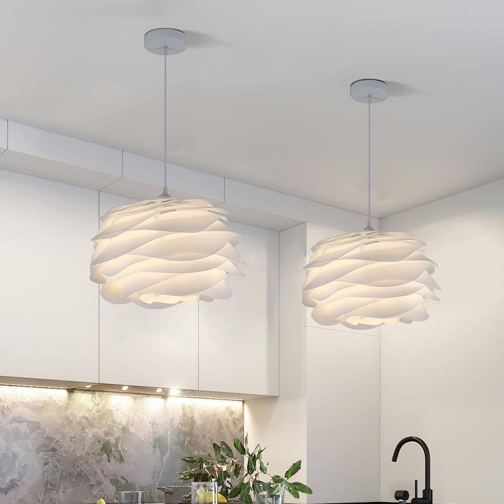 Floral pendant light with white roses lit in an entry hall