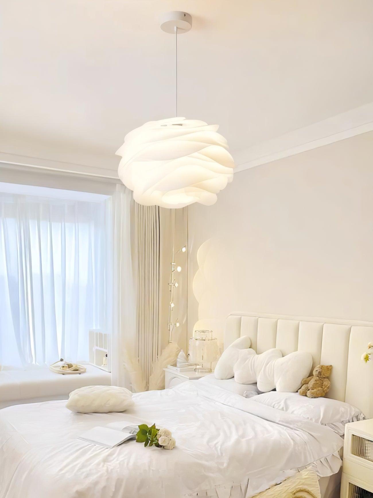 Rose floral pendant light suspended above a table setting