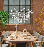 Firefly LED-lysekrone, roseguld gren, polykarbonat blade, dæmpbar