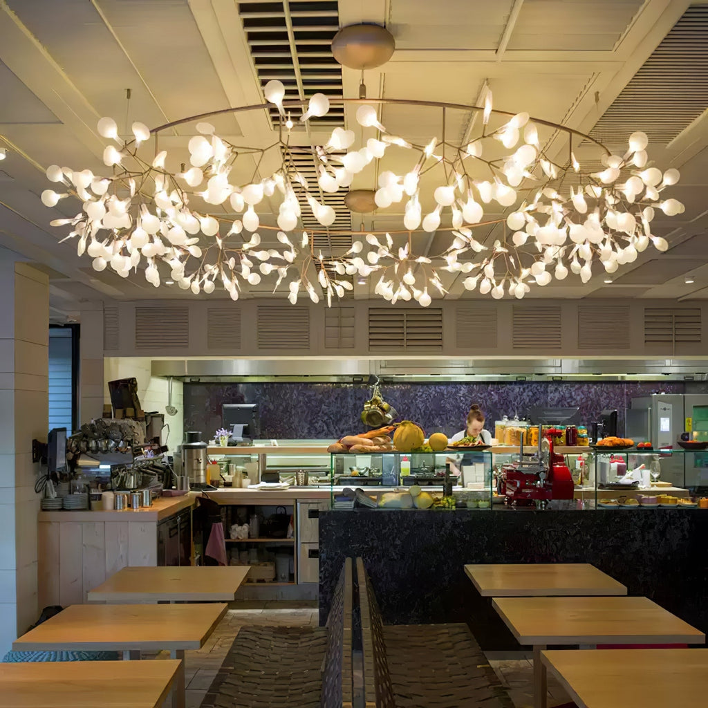 Firefly chandelier glowing softly above a dining space