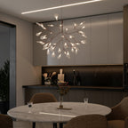 Rose gold branch chandelier with warm glowing leaves