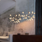 Rose gold firefly chandelier lighting an elegant interior
