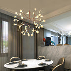 Rose gold firefly chandelier detail of lit white leaves