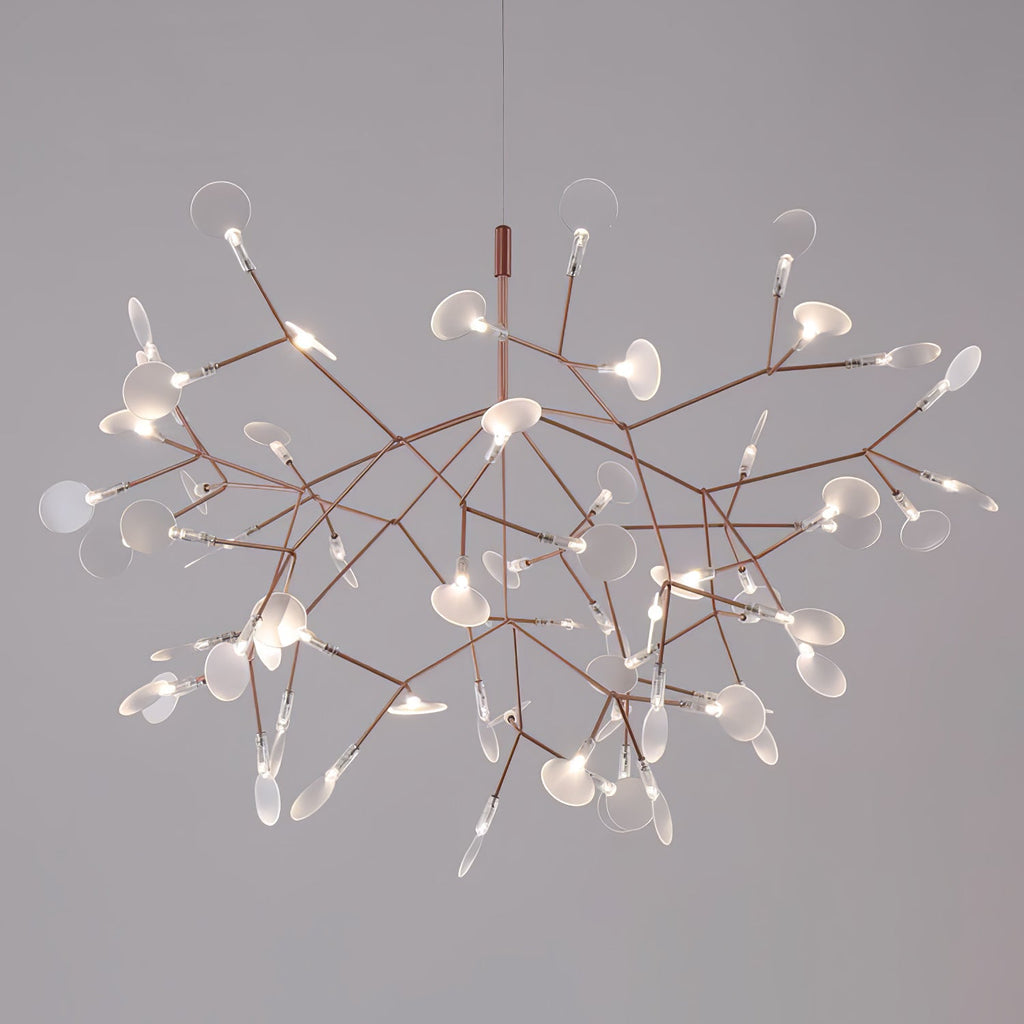 Rose gold firefly chandelier suspended over a table