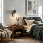 Matte cylinder wall lamp with shade tilted downward
