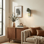 Cylinder wall lamp pivoted upward for ambient lighting