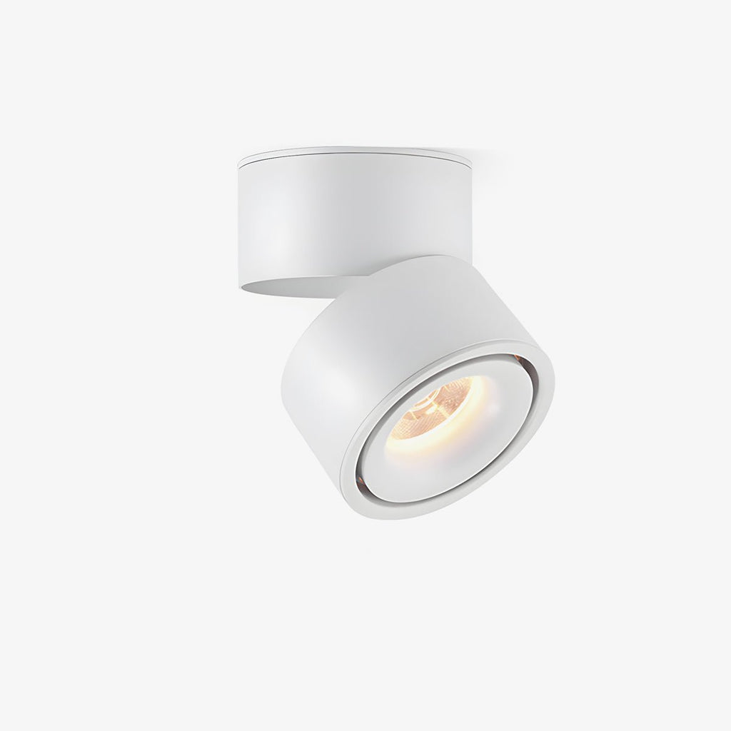 This Clérachic spotlight is shown in white, its cylindrical head angled down from the round ceiling base.