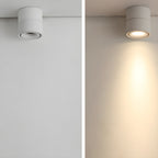 Two views of this white Clérachic spotlight: mounted plain on a wall, then lit with its beam angled down.