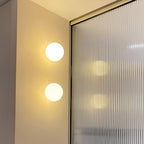 Round Glass LED Wall Sconce Minimalist One Light Fixture For Modern Interiors