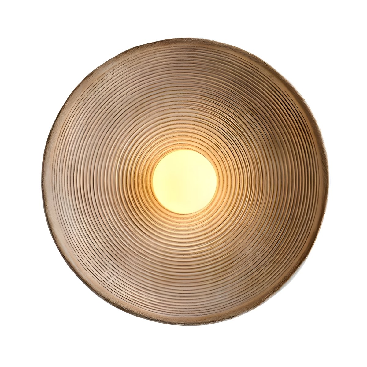 The round wall sconce lit, warm light washing outward across its ribbed vintage-look surface.