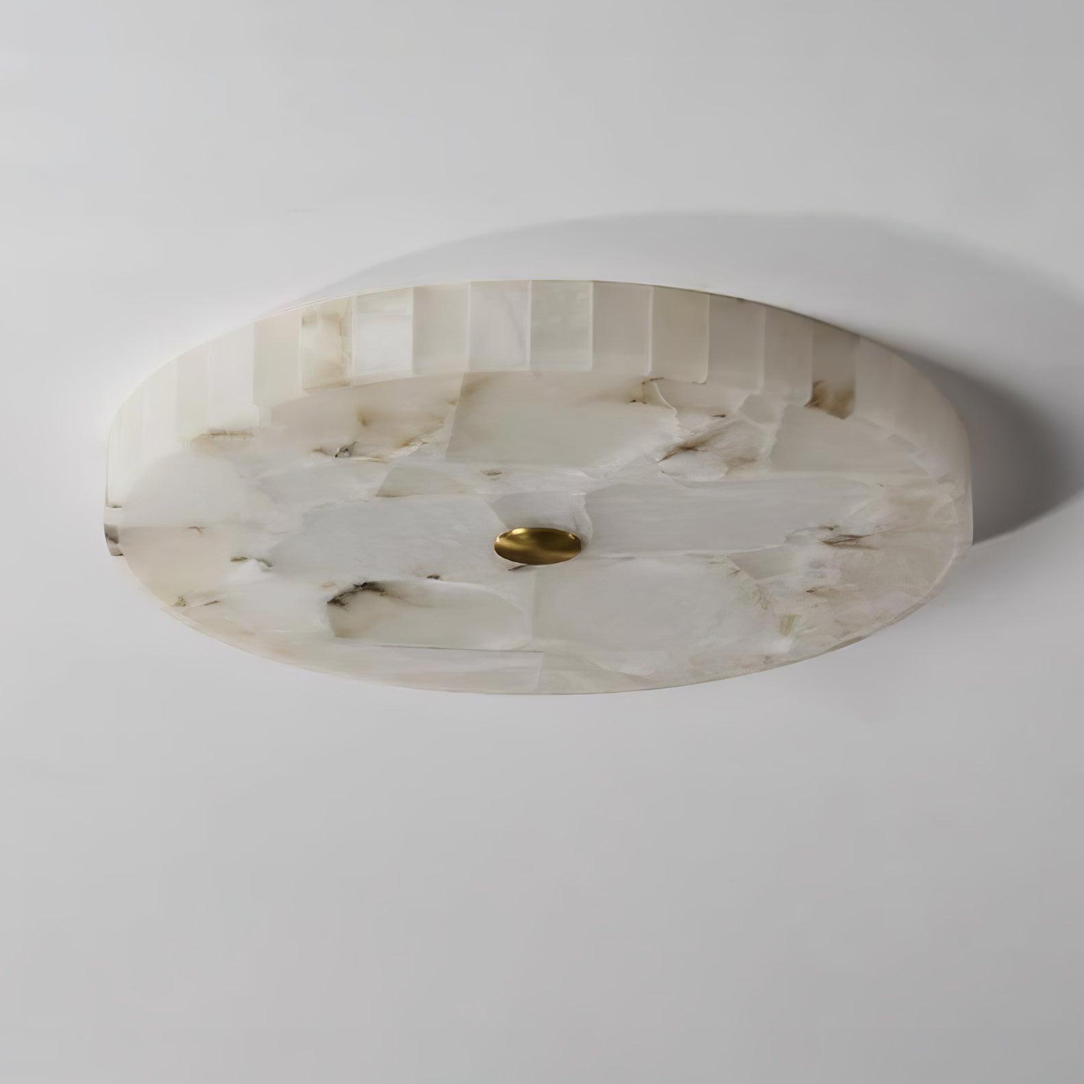 Unlit Kristy ceiling lamp against a pale wall, its cool white alabaster panels clearly seamed