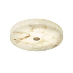 Product shot on white of the flushmount unlit, showing caramel veining running through the stone