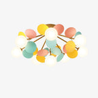Macaron ceiling lamp glowing above a styled living area