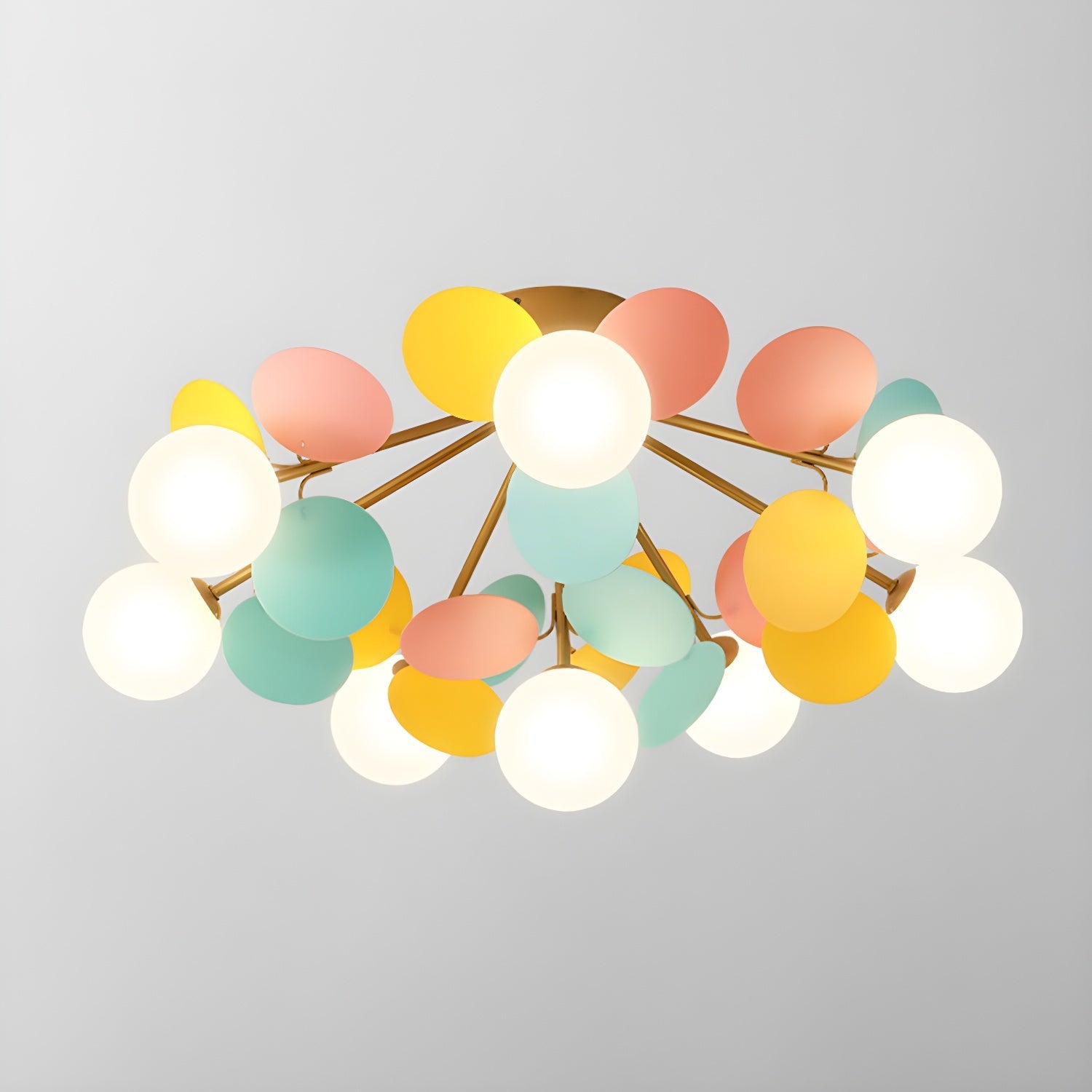 Macaron ceiling lamp shown from below with discs spread