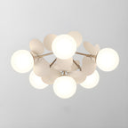 Multi-head macaron ceiling lamp glowing warm white