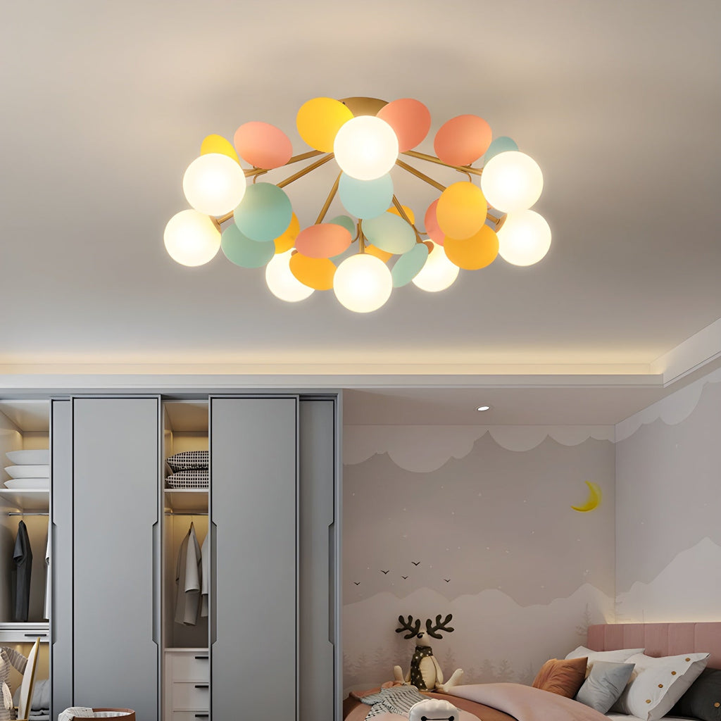 Acrylic leaf discs catching soft light on the ceiling lamp