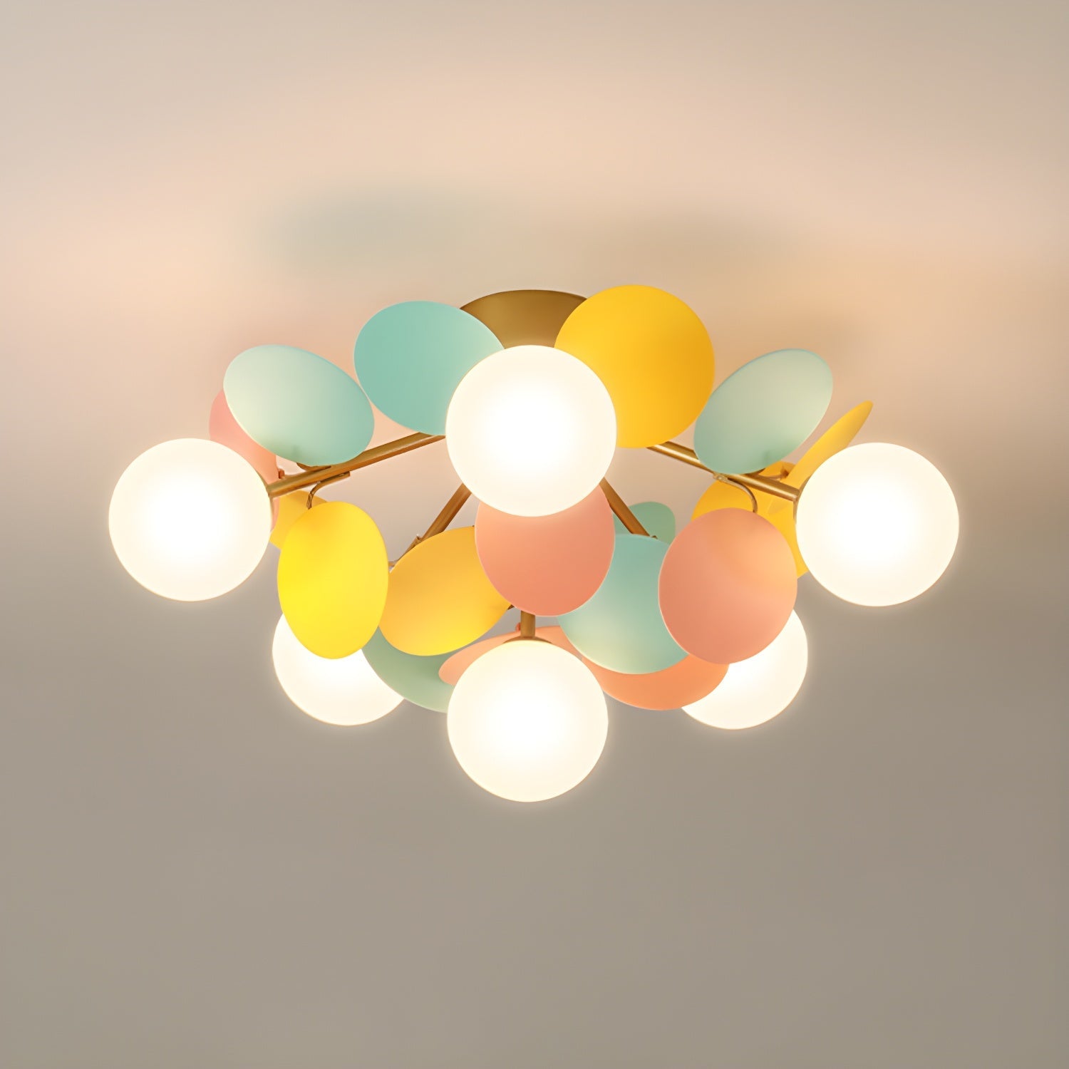 Macaron ceiling lamp with pastel discs in a bright interior