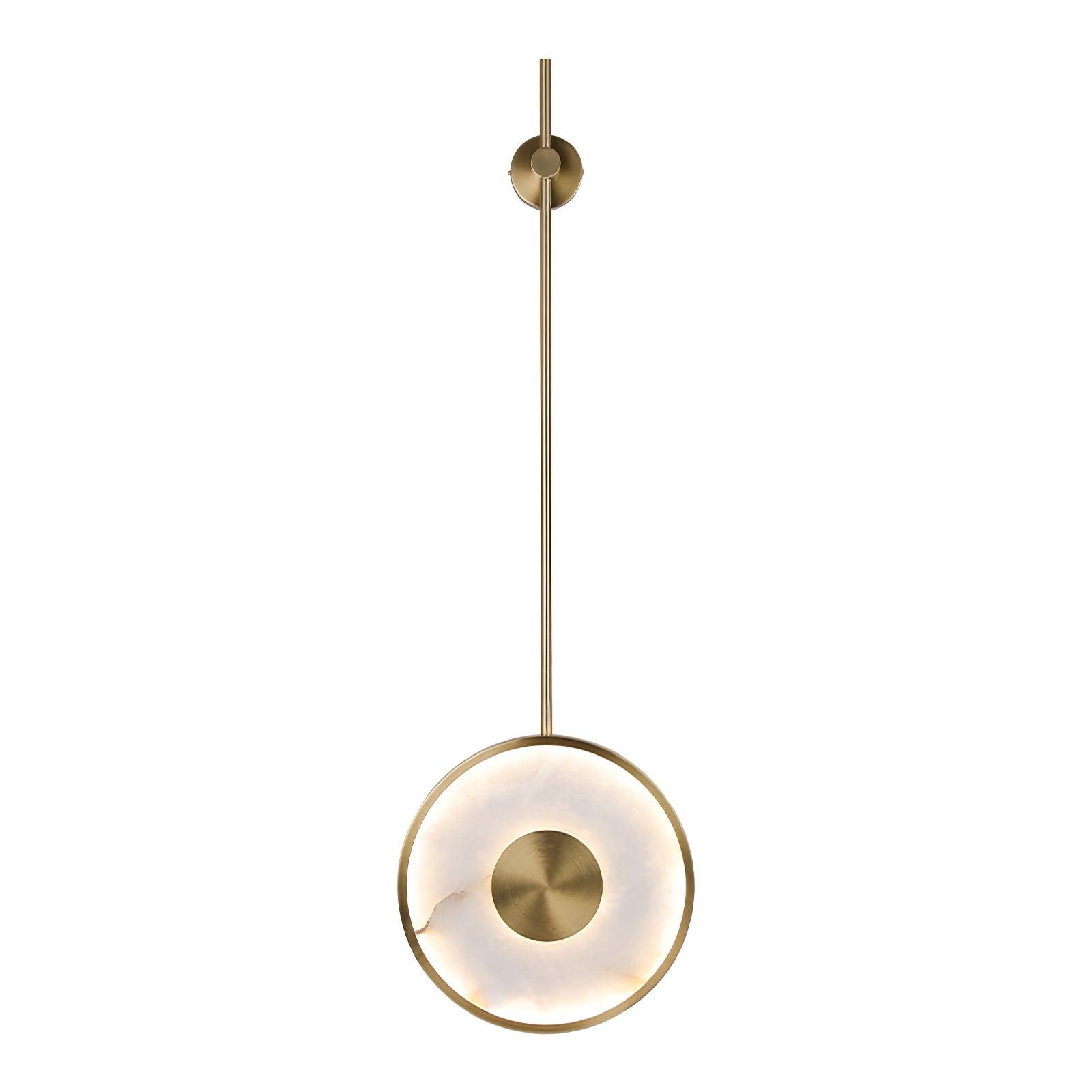 The medium-rod version on white, brass rod centred above the lit alabaster disc.