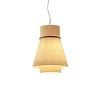 This Clérachic pendant's pleated beige shade glows warm on a wide flared rim, hanging alone against a plain backdrop.