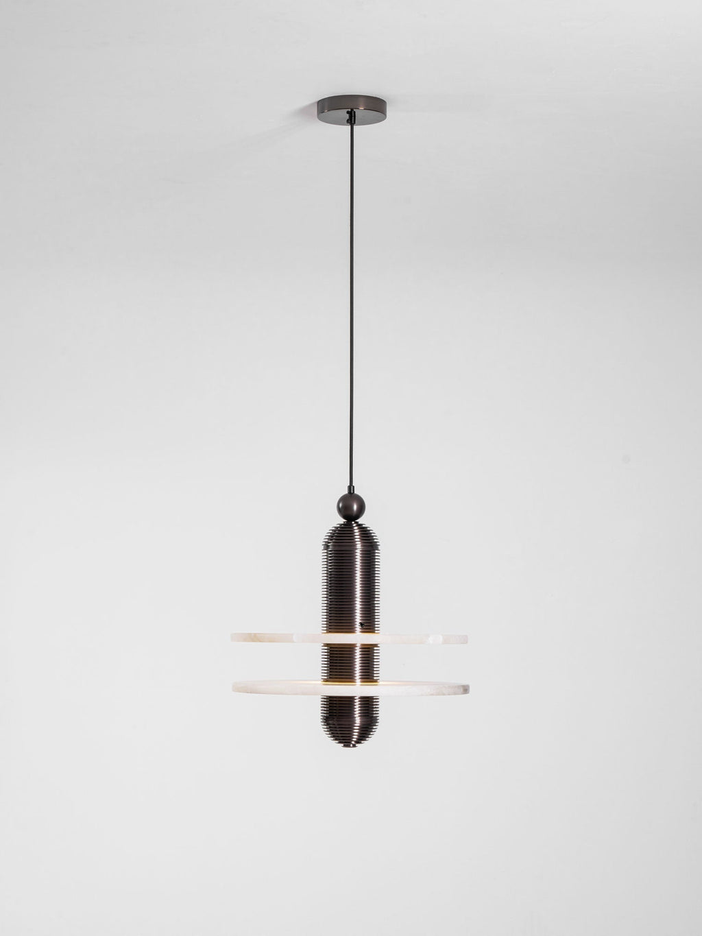 Full drop of the dark bronze Saturn pendant with its round ceiling canopy and black cord