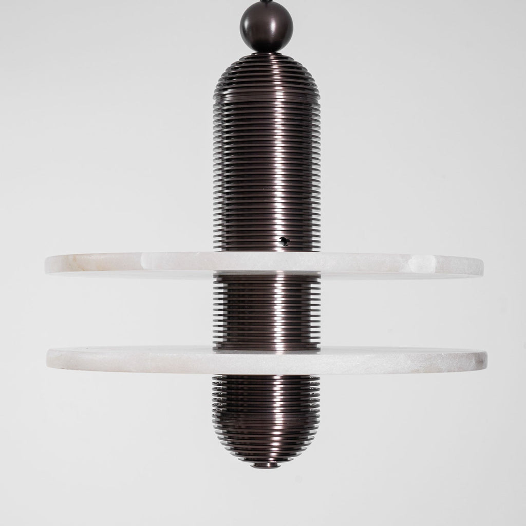 Straight-on studio crop of the dark bronze Saturn pendant with both alabaster discs, unlit