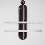 Straight-on studio crop of the dark bronze Saturn pendant with both alabaster discs, unlit