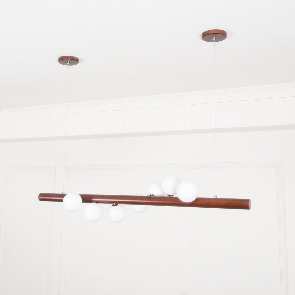 Scandinavian walnut pendant light with five opal glass globes