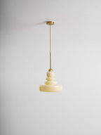 Schoolhouse glass pendant light detail of glowing shade