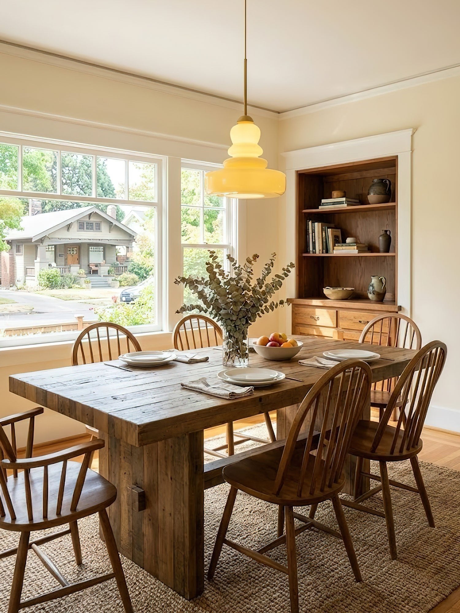 Schoolhouse glass pendant light shown from the side