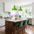Beige schoolhouse pendant with a softly glowing glass shade