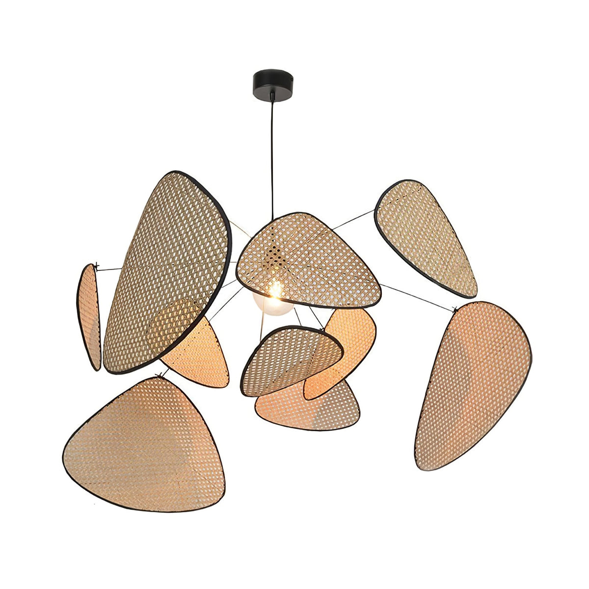 A studio shot catches this Clérachic pendant with its bulb lit, glowing warmly through the bamboo-weave centre panel.