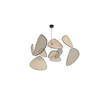 A studio shot on a white background angles this Clérachic pendant to show the gaps between its bamboo-weave paddles.