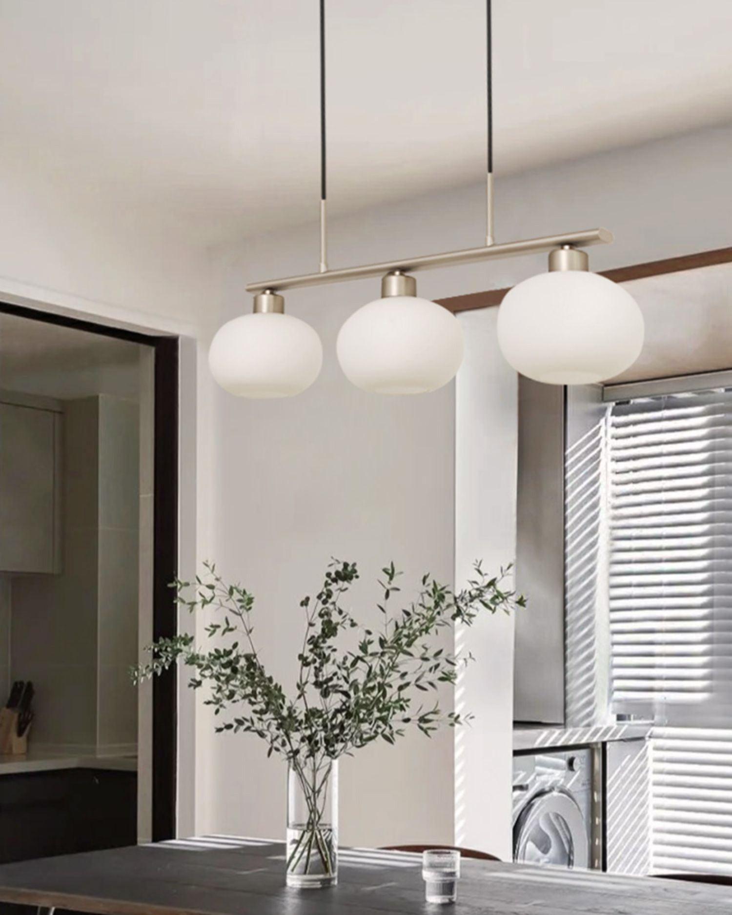 Globe pendant light creating a cozy dining atmosphere