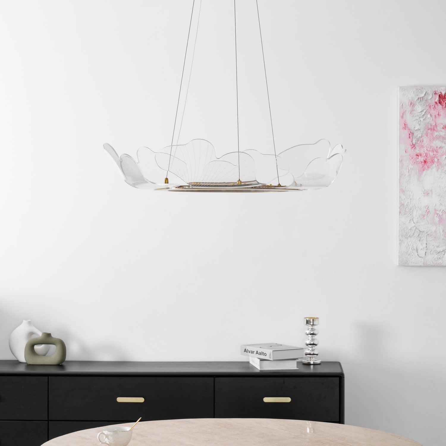 Layered leaf-form chandelier with soft warm-white glow
