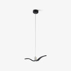 A black bird-shaped pendant from this Clérachic light drops on a long cord from a round black canopy, on a light-grey backdrop.