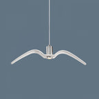 Seen front-on, a single white bird-shaped pendant from this Clérachic light hangs against a slate-blue backdrop.