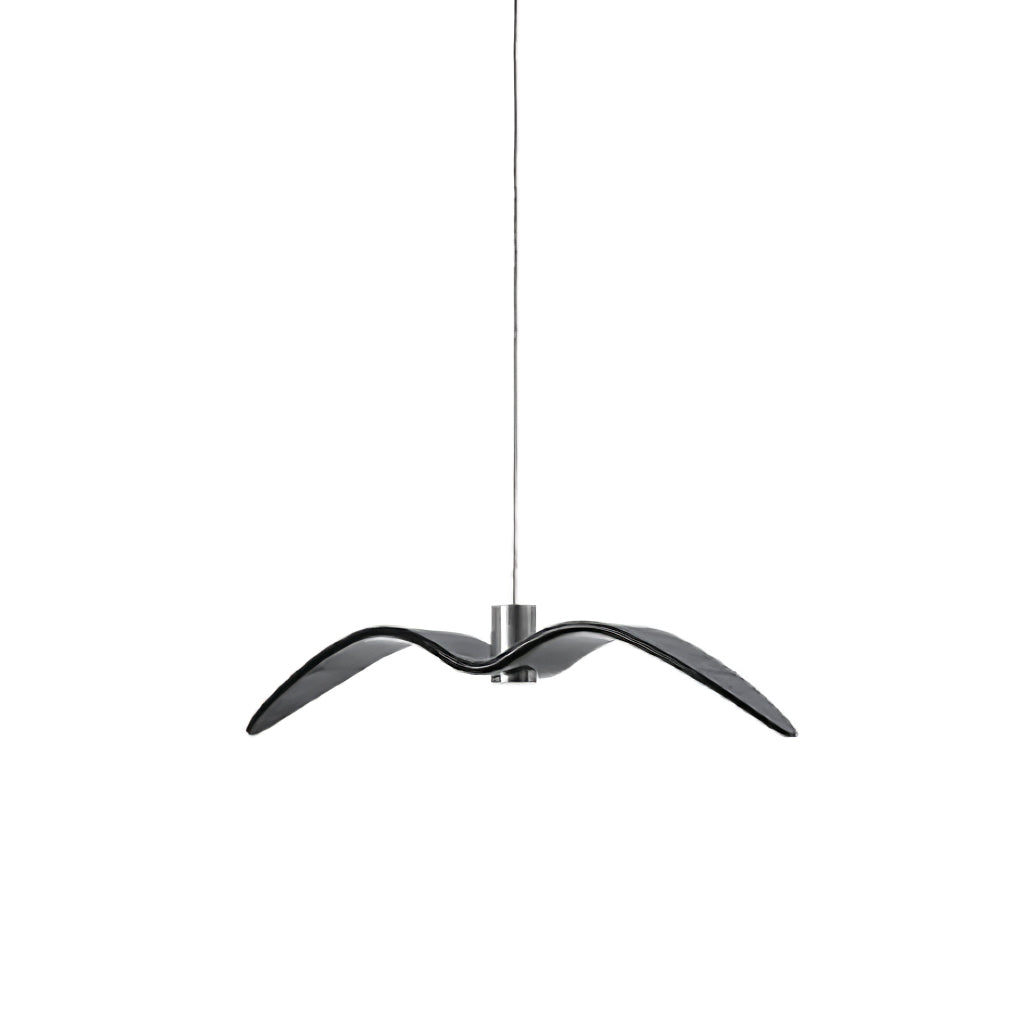 A black bird-shaped pendant from this Clérachic light hangs front-on, on a plain white backdrop.