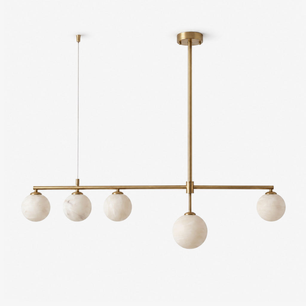 Shown unlit from the front on a plain white background, this brass Clérachic chandelier's rod and cable keep the bar level.