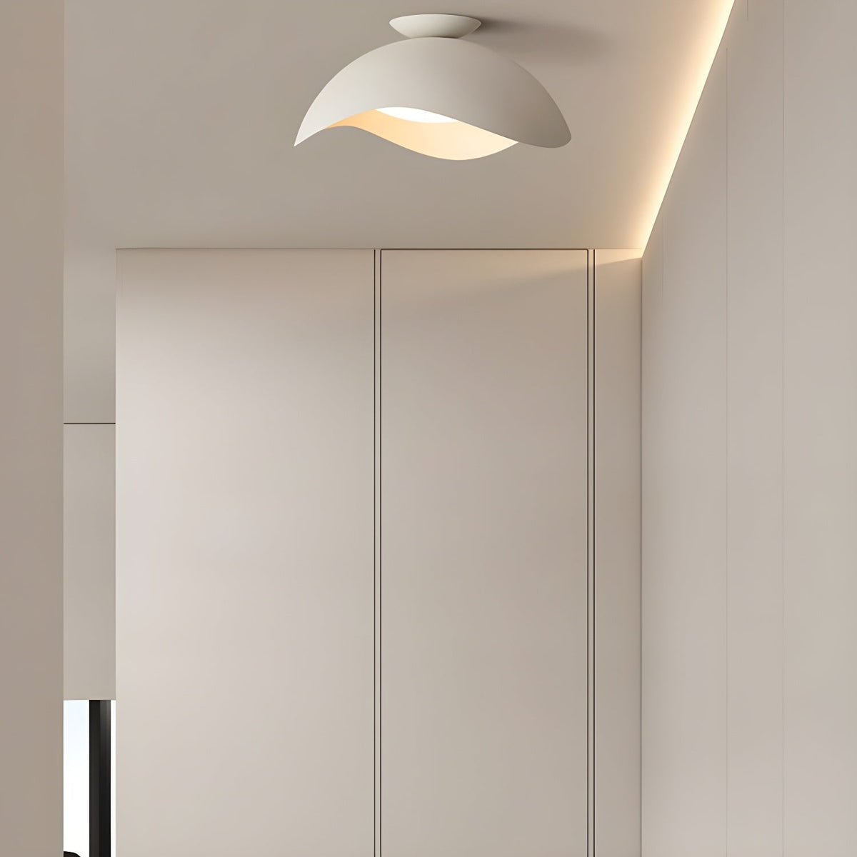 In a hallway lined with closet doors and warm cove lighting, this Clérachic ceiling light glows softly above.