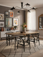 Suspended multi-arm ceiling light with sculptural reflectors