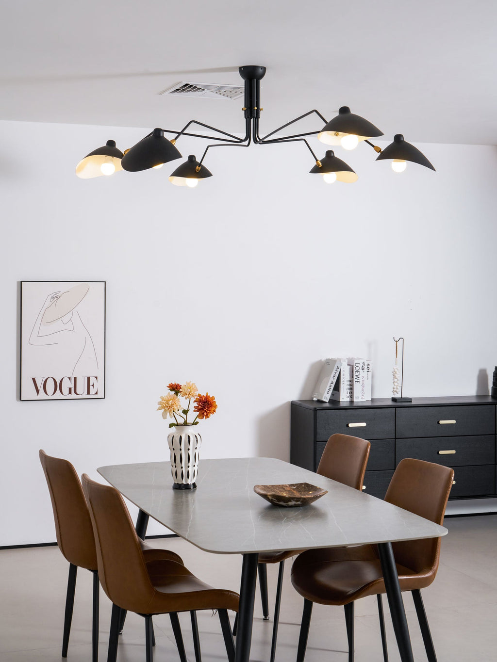 Spider ceiling light with steel arms and brass hardware