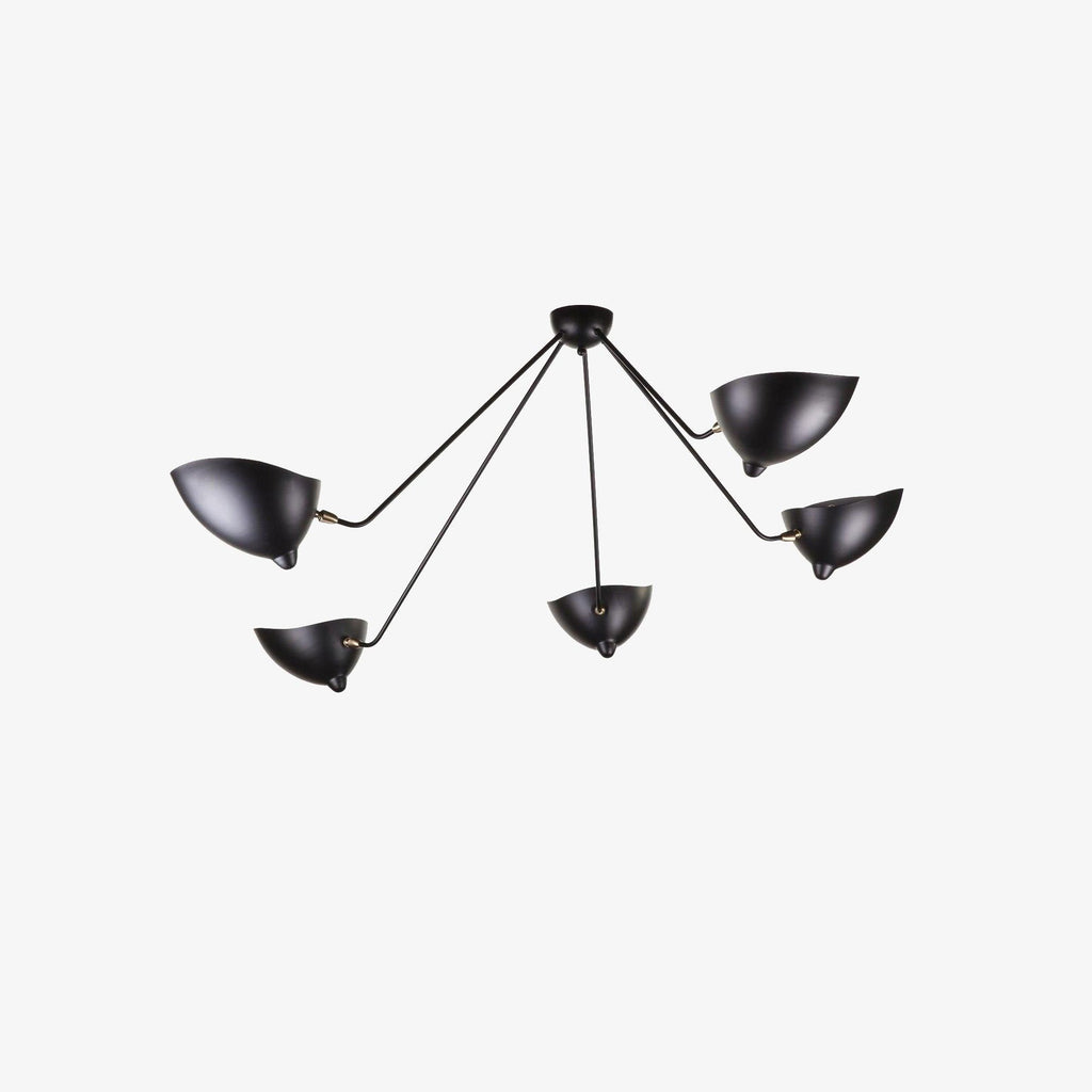 Five-arm spider ceiling light suspended in a bright room
