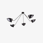 Five-arm spider ceiling light suspended in a bright room
