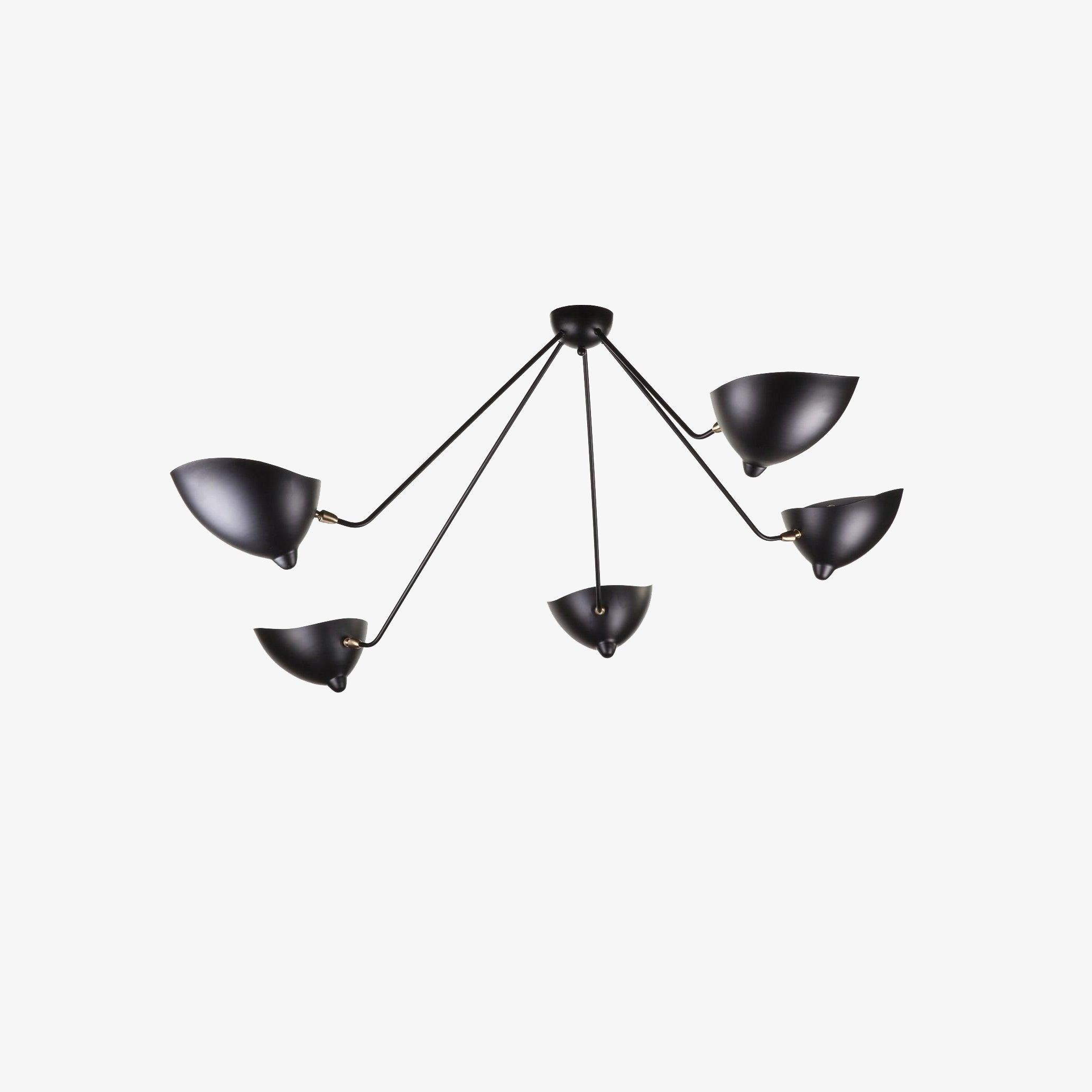 Five-arm spider ceiling light suspended in a bright room