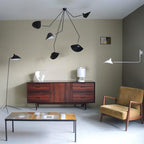 Spider ceiling lamp with delicate steel arms overhead