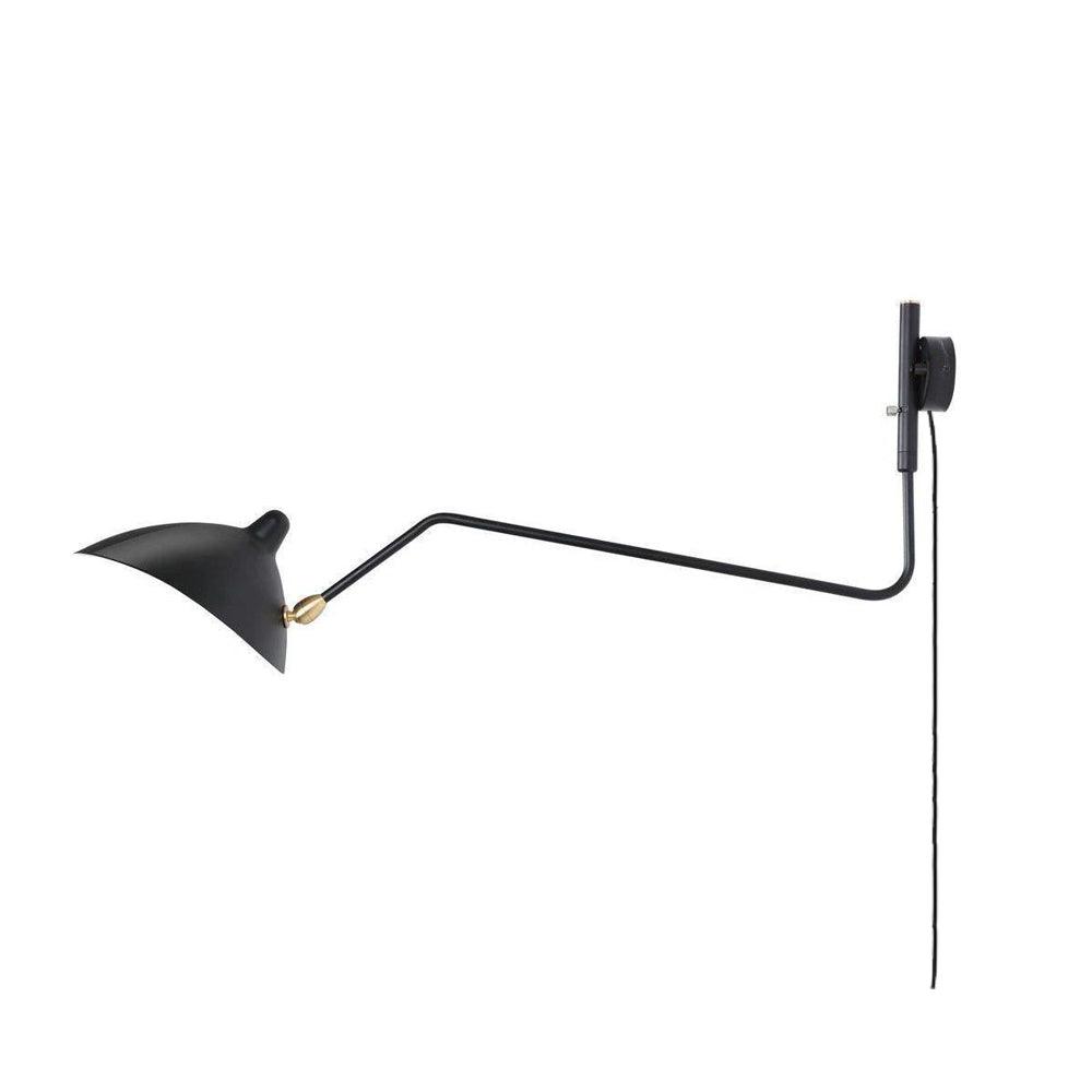 Plug-in wall sconce with long swing-arm reaching across the room