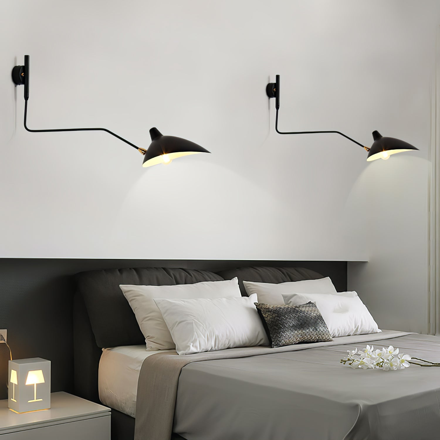Spider wall sconce with rotating cone shade and slim arm