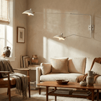 Spider wall sconce arm and pivoting shade detail in black