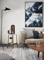 Floor lamp arm joint and counterweight detail in matte black